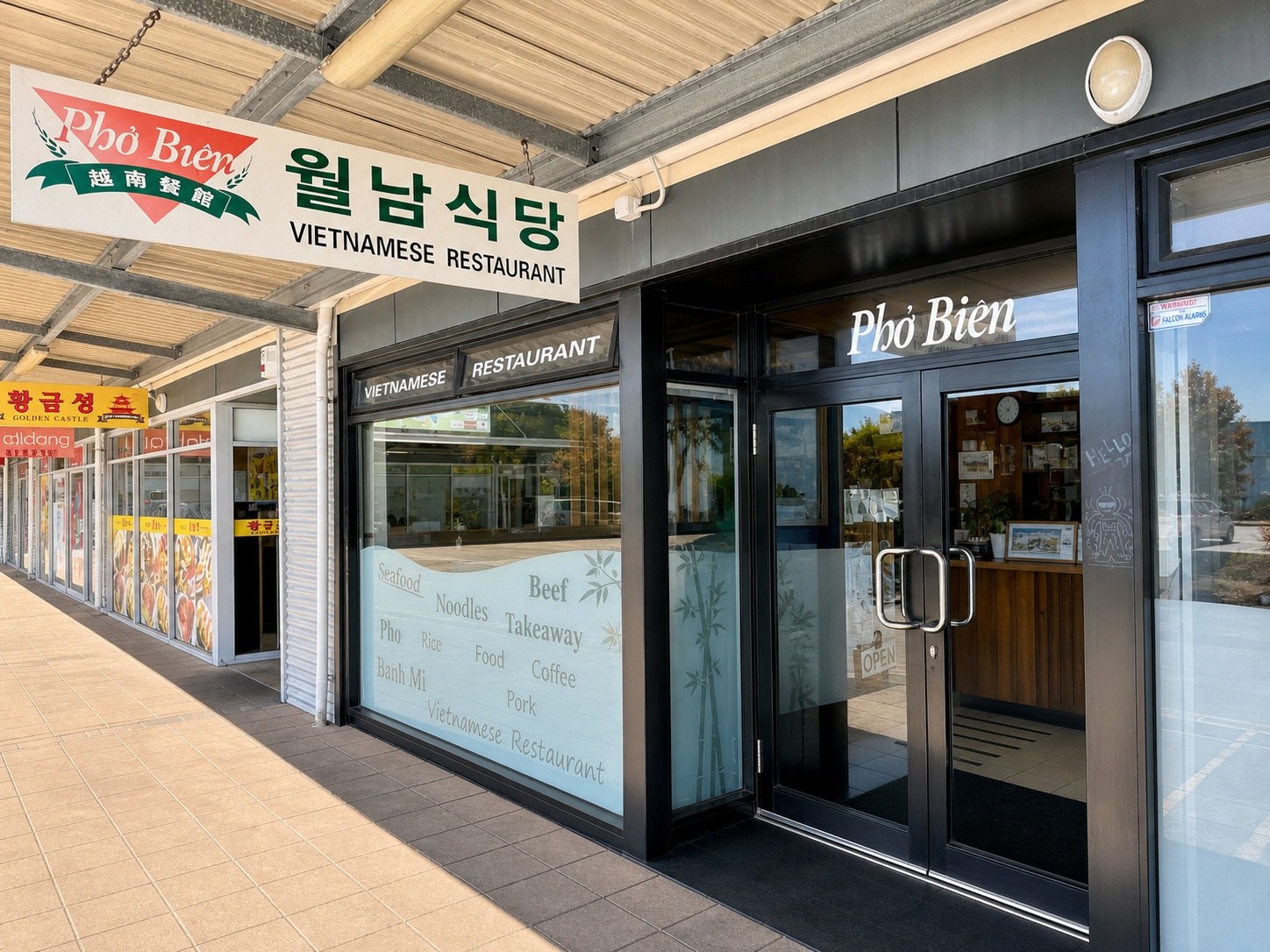 The Phở Biên sign and shopfront window on Paramount Drive
